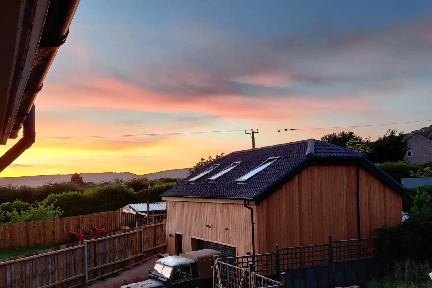 Exterior of The Studio Cheddar — architect-designed eco-luxury lodge in Draycott, Somerset, five minutes from Cheddar Gorge, dog friendly, Mendip Hills AONB